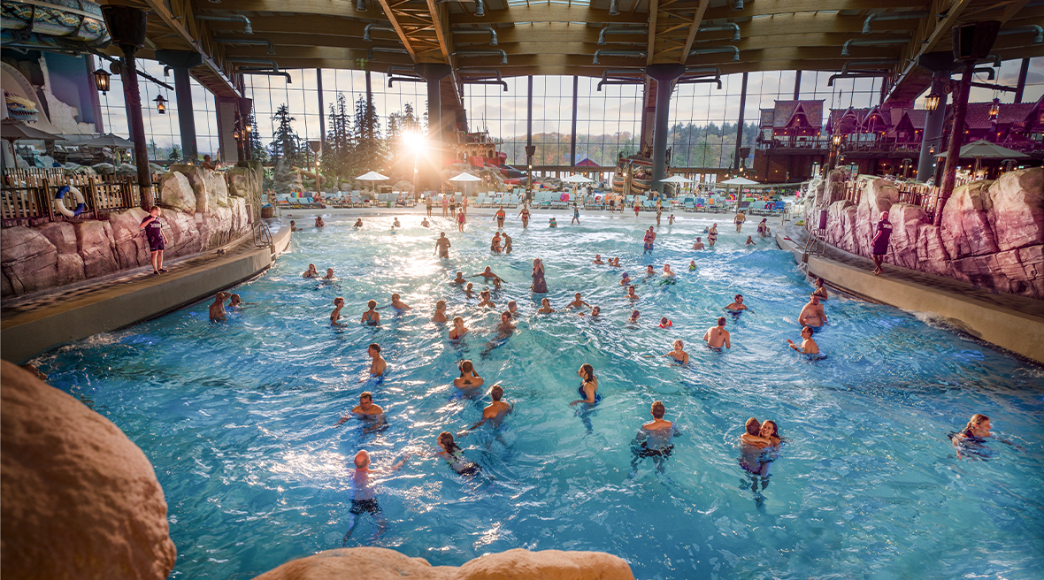 People swimming in a themed indoor swimming pool